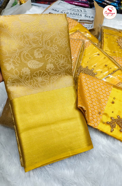 Kanchipuram tissue Saree with Aari work Blouse